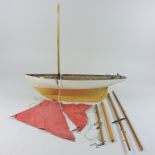 An early 20th century painted wooden pond yacht