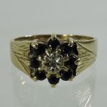 A 1960's 9 carat gold ladies sapphire and diamond cluster ring