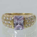 An 18 carat gold amethyst and diamond ring,