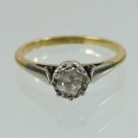 An unmarked platinum set solitaire diamond ring, approximately 0.