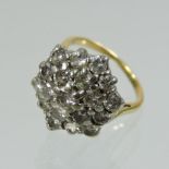 An unmarked diamond set cluster ring,