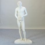 A plaster statue of a male nude,