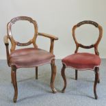 A set of eight Victorian walnut dining chairs,