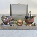 A collection of copper and brass ware to include copper fender,