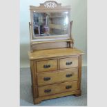 A late Victorian satin walnut dressing chest,