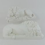 A pair of reconstituted marble models of lions,