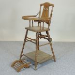 A 19th century metamorphic turned wooden child's high chair