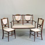 An Edwardian mahogany and inlaid chair back sofa, 122cm,