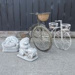 A wire framed garden planter in the form of a bike, 70cm long,