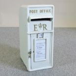 A white painted metal GPO postbox,