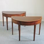 A pair of George III style mahogany and crossbanded D end side tables,