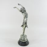 An Art Deco style silvered model of a lady,