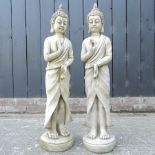 A pair of reconstituted stone figures of standing buddhas,
