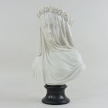 A marble resin bust of the veiled bride,