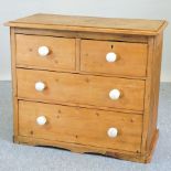 An antique pine chest, on a plinth base, 85cm,