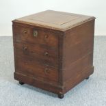 An 18th century oak box, with a hinged lid,