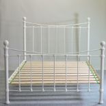 A modern white metal double bedstead,
