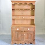 An antique pine dresser, with a plate rack,