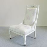 An Edwardian and later white painted and floral upholstered side chair