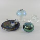 A Ditchfield iridescent glass mushroom paperweight, signed, together with a Heron glass paperweight,