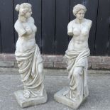 A pair of reconstituted stone garden figures of ladies,