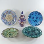 A collection of tin glazed pottery chargers,