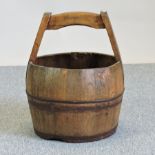 A Chinese coopered elm bucket,