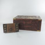 An early 20th century carved hardwood and brass bound writing slope, 50cm,