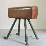 A 1940's leather and painted metal gymnastics horse,