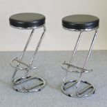 A pair of chrome bar stools