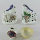A miniature Moorcroft vase, 5cm tall, together with a similar bowl and two Staffordshire figures,