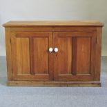 A light oak dresser base, on a plinth base,