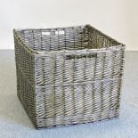 A large wicker log basket,