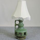 A 1960's green stoneware table lamp and shade,