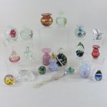 A collection of various coloured glass vases, paperweights and scent bottles,