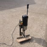 An electric morticer bench drill