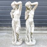 A pair of reconstituted stone garden figures of ladies,