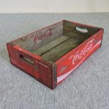 A painted wooden Coca Cola advertising tray,