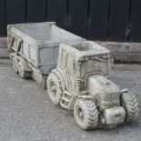 A reconstituted stone model of a tractor and trailer,