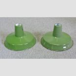 A pair of green enamelled industrial light shades,