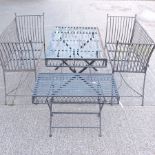 An iron garden table, 130 x 74cm, together with a pair of benches, 130cm,