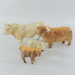 A Beswick model of a Highland bull, 13cm tall, with calf,