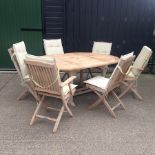 A teak garden table, 181 x 120cm,