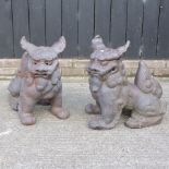 A pair of glazed stoneware temple dogs,