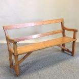 An antique pine settle,