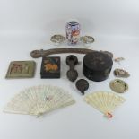 A box of oriental and ethnic items, to include Chinese fans, china and carvings,