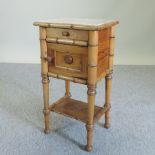 A late 19th century pine pot cupboard, with a marble inset top,