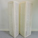 A white painted folding screen,
