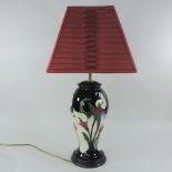 A modern Moorcroft pottery table lamp, boxed,