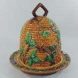 A majolica honey pot cheese dome and cover,